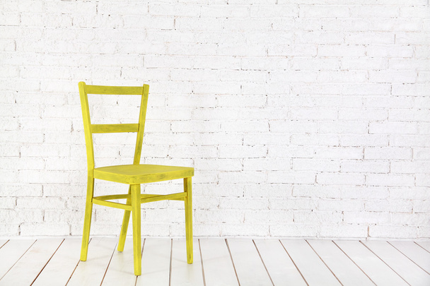 White interior with yellow chair - Foto, imagen