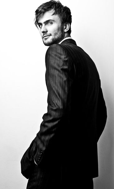Elegant stylish handsome man. Black-white studio fashion portrait.  - Zdjęcie, obraz