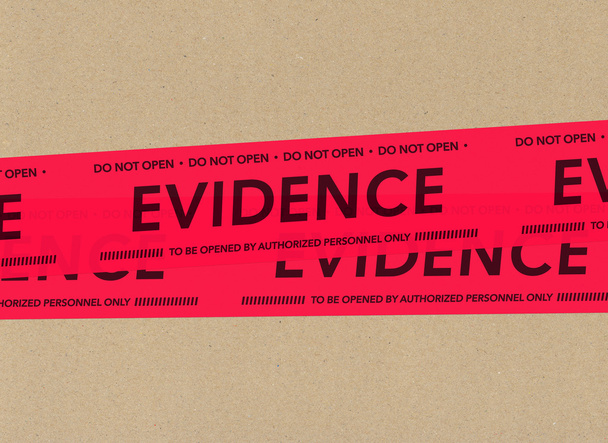 Evidence tape on cardboard - Photo, Image