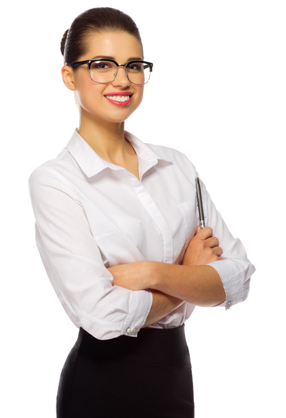 Young businesswoman with glasses and pen - Foto, Bild