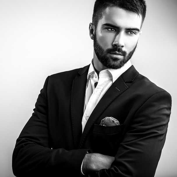 Elegant young handsome man. Black-white studio fashion portrait.  - Foto, Bild