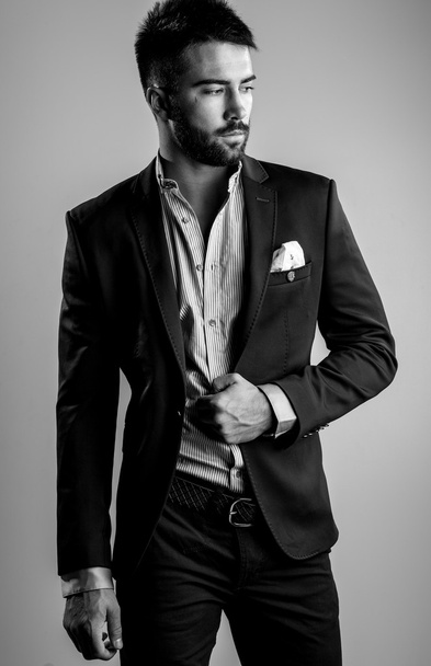 Elegant young handsome man. Black-white studio fashion portrait.  - Valokuva, kuva