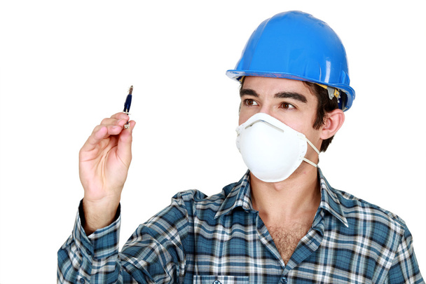 Builder wearing face mask - Foto, imagen