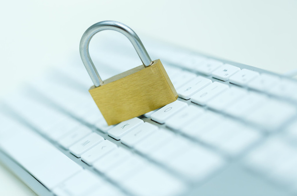 Security lock on white computer keyboard - Photo, Image