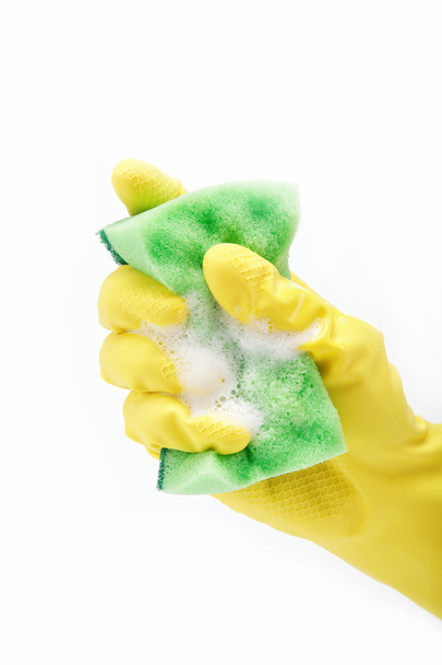 A yellow cleaning glove with a sponge against a white background - Φωτογραφία, εικόνα