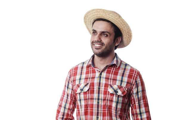 Portrait of brazilian man wearing typical clothes for the Festa  - Фото, изображение