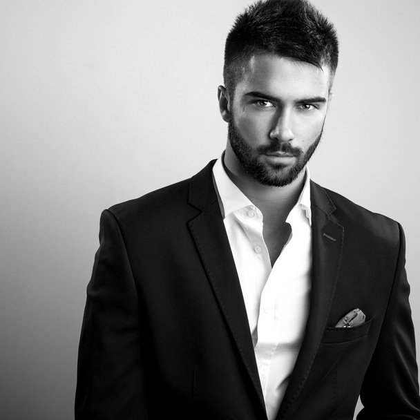 Elegant young handsome man. Black-white studio fashion portrait.  - Photo, Image