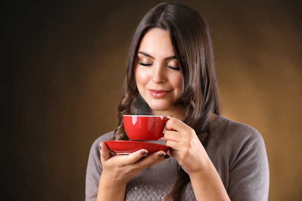 Pretty woman with cup of coffee - Foto, Imagem