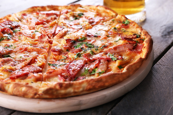 Tasty pizza and glass of beer  - Photo, image