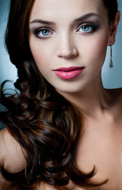 Portrait of beautiful woman with professional makeup - Fotó, kép