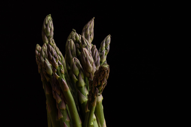 asparagus on black - Foto, imagen