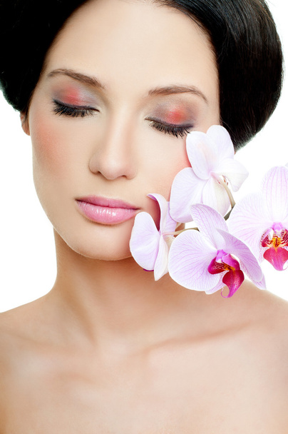 girl with pink orchid - 写真・画像