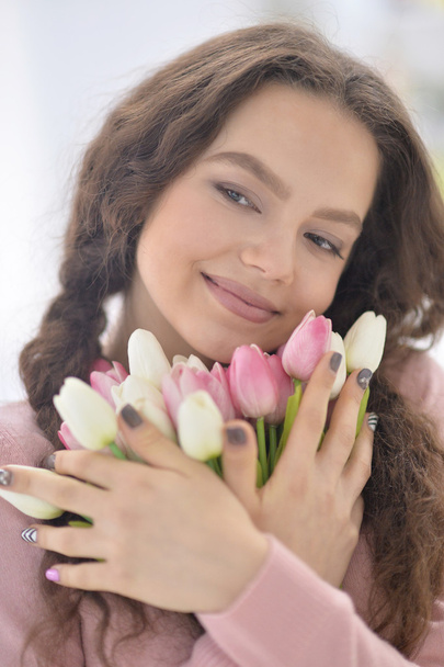 beautiful  woman  with tulips - Photo, Image
