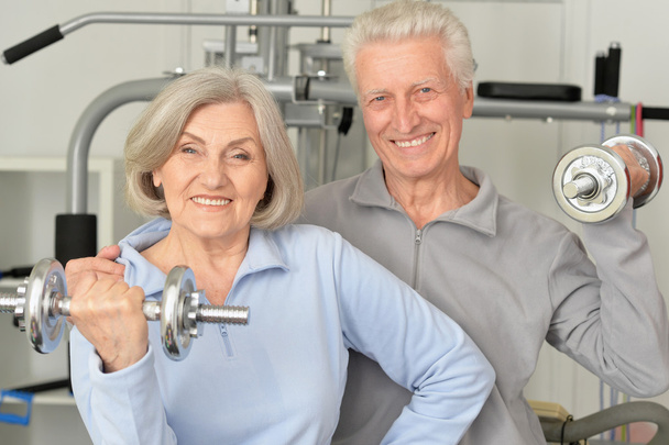 senior couple exercising in gym - Φωτογραφία, εικόνα