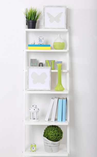 bookcase with books and accessories - Valokuva, kuva