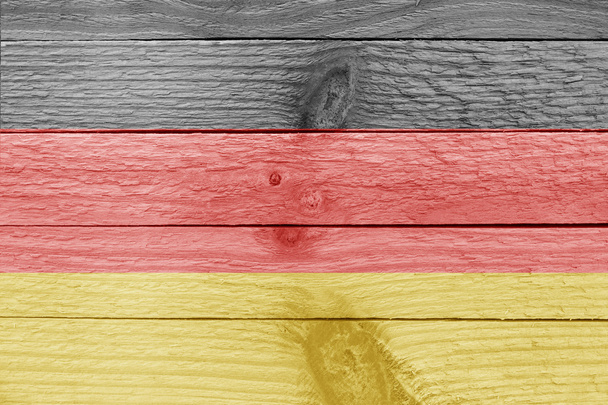 Немецкий флаг на деревянной доске
 - Фото, изображение