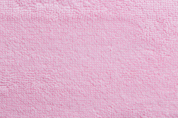 Μια λεπτή υφή του μαλακό ροζ βαμβάκι πετσέτα μπάνιου - Φωτογραφία, εικόνα