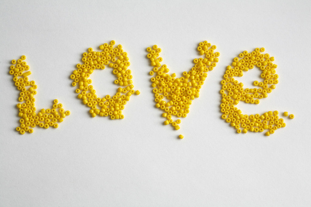 Word love. beads - Foto, Bild