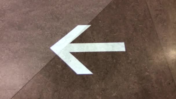 Motion of arrow sign on floor at Ikea store - Footage, Video