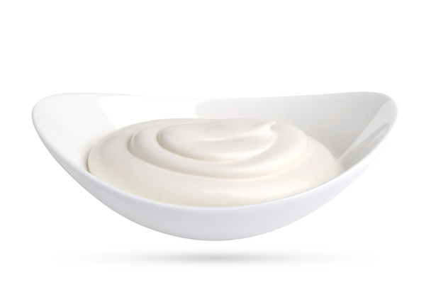 Mayonnaise or sour cream bowl isolated on white background with clipping path. - Photo, Image