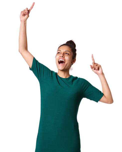 Izgatott fiatal nő kezet emelt ünnepe - Fotó, kép
