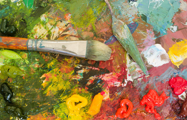 Oil paints and brush on palette. Abstract Background. Colorful t - Foto, afbeelding