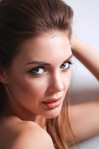 Close up portrait of beautiful young woman face. - Photo, image