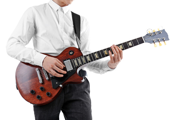 Young man playing electric guitar - Foto, imagen