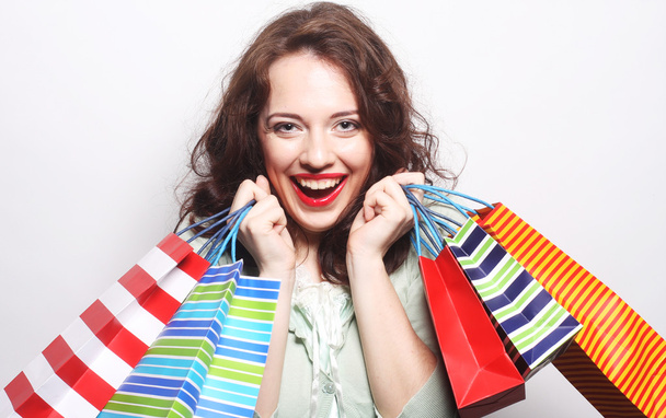 woman with colored shopping bags - Foto, Imagem