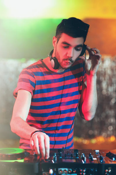 DJ playing music at mixer  - Foto, imagen