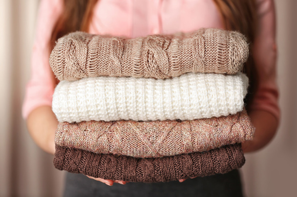 Stack of knitted clothes   - Valokuva, kuva