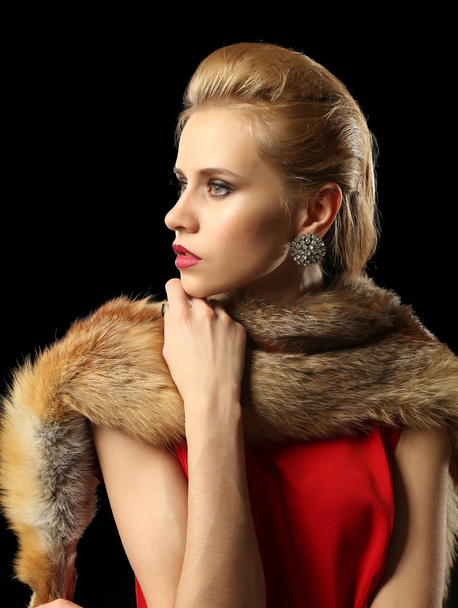 Beautiful young woman with luxury fur - Photo, Image