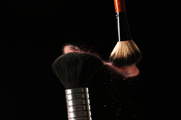 Two make up brushes with powder - Fotoğraf, Görsel