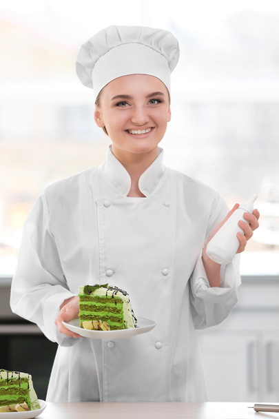 Female chef working at kitchen - Φωτογραφία, εικόνα