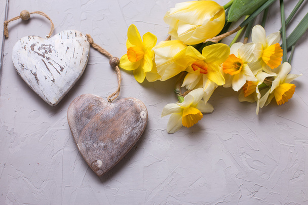 Fresh spring flowers and decorative hearts  - Fotografie, Obrázek