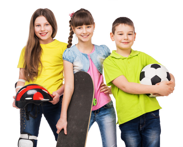 playful children holding sport equipment in hands - Fotografie, Obrázek