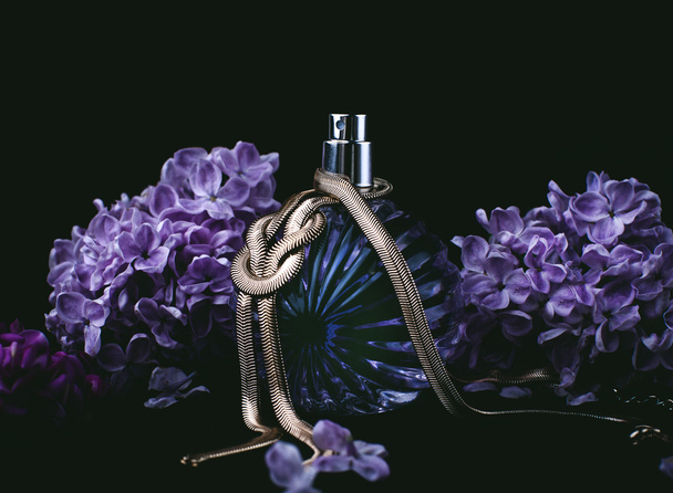 perfume and purple flowers - 写真・画像