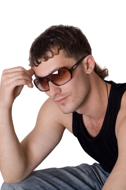 Young man in sunglasses. Isolated on whi - Foto, afbeelding