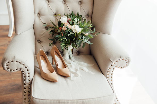 bridal bouquet of peones with white shoes - Photo, Image