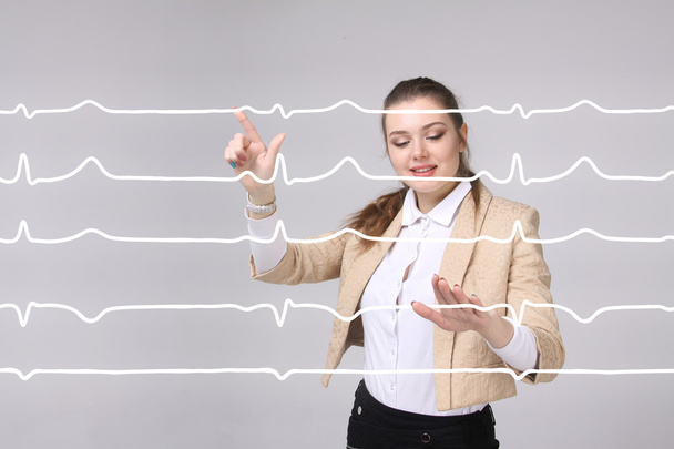 Doctor woman working with cardiogram lines - Фото, изображение