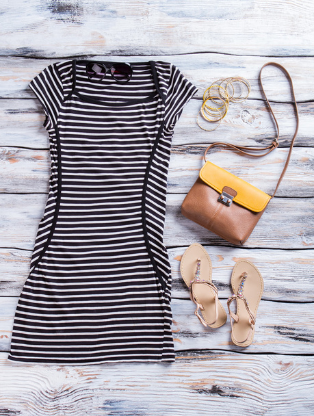 Striped dress with dark sunglasses. - Photo, Image