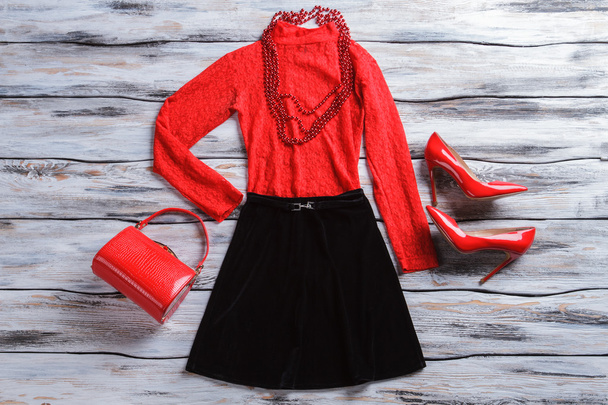 Red top with black skirt. - Photo, Image
