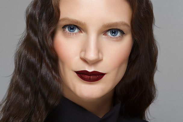 portrait of fashion model with eyes like gimlets. red lips and b - Zdjęcie, obraz