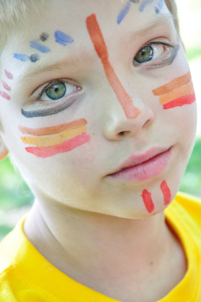 Child with paintings on his face - Fotoğraf, Görsel