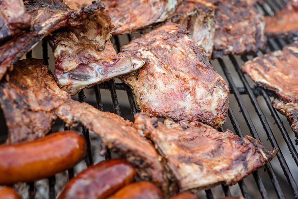 Grilled pork ribs on the grill. - Photo, Image