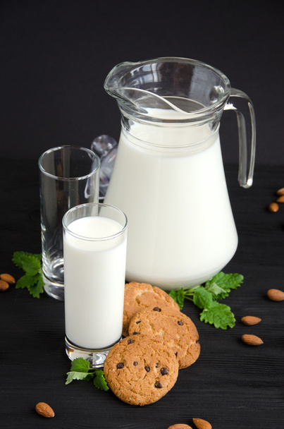 milk and cakes with almonds - 写真・画像