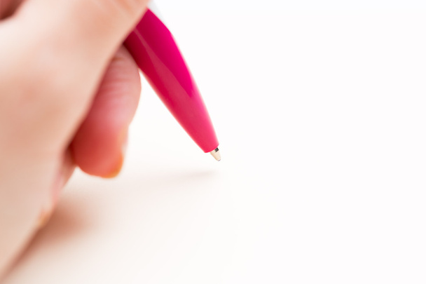 ballpoint pen writing in notebook - Фото, изображение