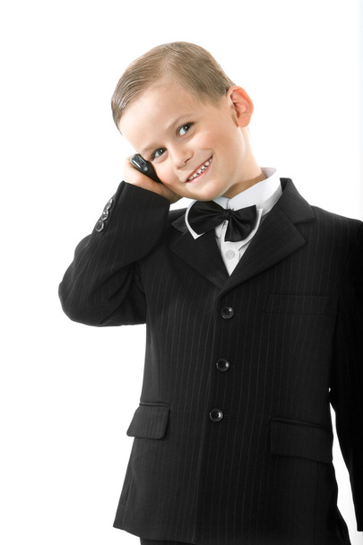 Boy holding a cellphone - Zdjęcie, obraz