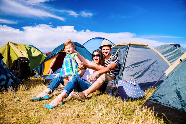 couple with baby daughter in tent	 - Foto, Bild