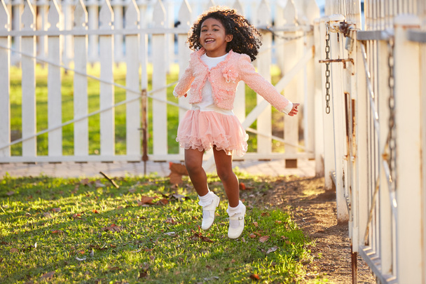 kid girl toddler playing jumping in park outdoor  - Foto, Imagem